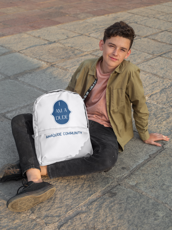 backpack-Amadude-featuring-a-happy-teenage-boy-sitting-on-the-floor